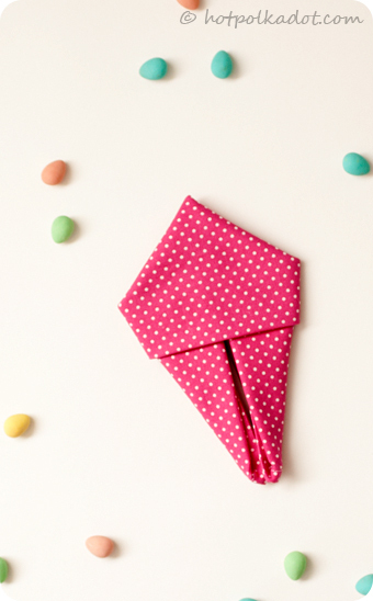 Learn how to fold your own bunny napkins just in time for Easter via @Lindsey {Hot Polka Dot}.