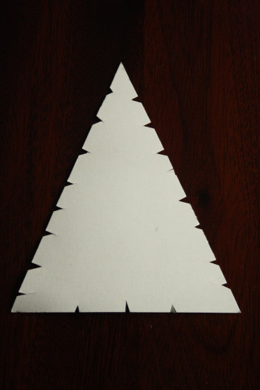 notched cardboard triangle for wool wrapped tree ornament