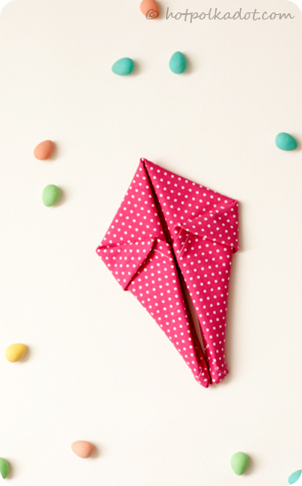 Learn how to fold your own bunny napkins just in time for Easter via @Lindsey {Hot Polka Dot}.